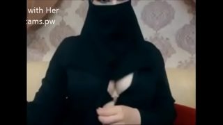 Indian Muslim girl in hijab live chatting on webcam